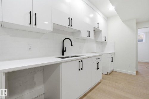 10723 70 Avenue, Edmonton, AB - Indoor Photo Showing Kitchen With Double Sink With Upgraded Kitchen
