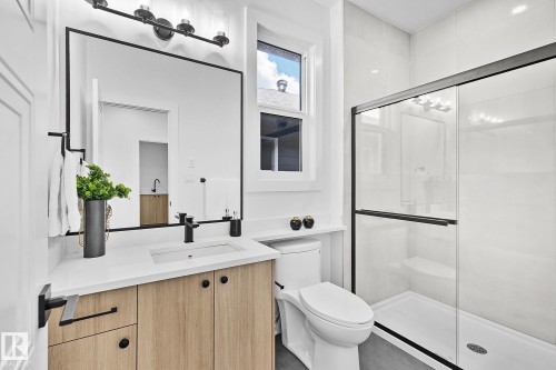 Full bathroom featuring vanity and a shower stall - 523 Ashgrove Circle, Leduc, AB - Indoor Photo Showing Bathroom
