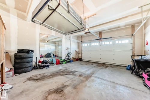 154 Aston Bend, Leduc, AB - Indoor Photo Showing Garage