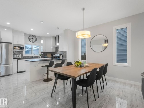 Dining space featuring baseboards and recessed lighting - 3510 48 Avenue, Beaumont, AB - Indoor Photo Showing Other Room