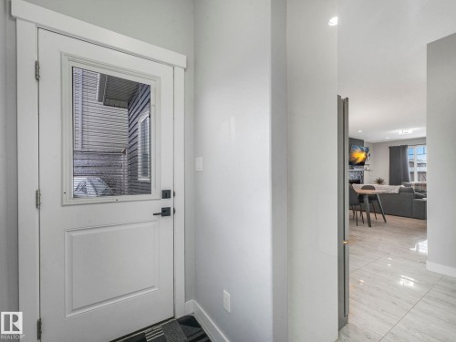 Entryway with baseboards and recessed lighting - 3510 48 Avenue, Beaumont, AB - Indoor Photo Showing Other Room
