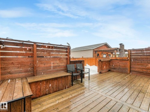 View of wooden terrace - 3510 48 Avenue, Beaumont, AB - Outdoor With Deck Patio Veranda With Exterior
