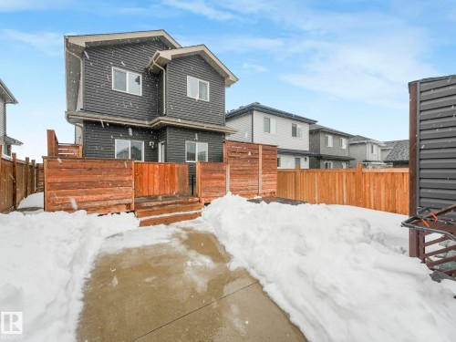 View of snow covered rear of property - 3510 48 Avenue, Beaumont, AB - Outdoor
