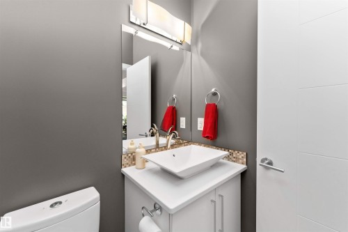 Bathroom with toilet and vanity - 7404 May Common, Edmonton, AB - Indoor