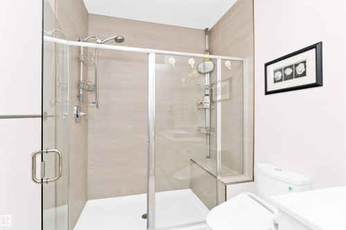 Bathroom with vanity and a shower stall - 7404 May Common, Edmonton, AB - Indoor Photo Showing Bathroom