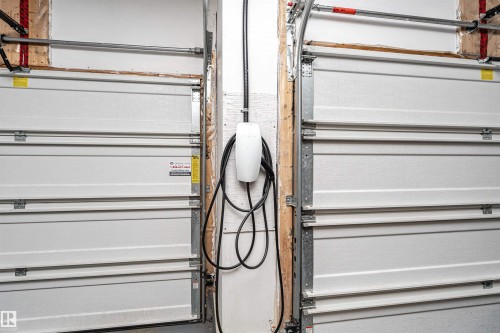 Garage view of electric vehicle charger - 7404 May Common, Edmonton, AB - 