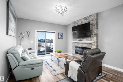 605 Boulder Wynd, Leduc, AB - Indoor Photo Showing Living Room With Fireplace