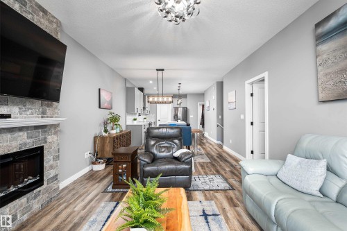 605 Boulder Wynd, Leduc, AB - Indoor Photo Showing Living Room With Fireplace