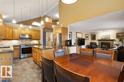 16 Oakmont Drive, St. Albert, AB - Indoor Photo Showing Kitchen With Fireplace With Stainless Steel Kitchen With Upgraded Kitchen