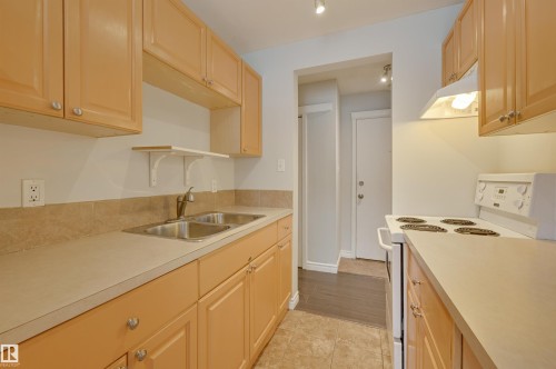 105 10621 79 Avenue, Edmonton, AB - Indoor Photo Showing Kitchen With Double Sink