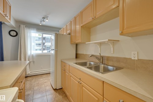 105 10621 79 Avenue, Edmonton, AB - Indoor Photo Showing Kitchen With Double Sink