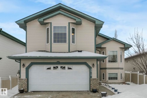 Traditional home featuring an attached garage and driveway - 2919 151A Avenue, Edmonton, AB - Outdoor