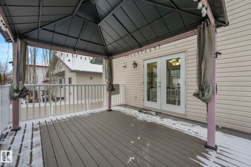 Wooden terrace featuring french doors and a gazebo - 2919 151A Avenue, Edmonton, AB - Outdoor With Deck Patio Veranda With Exterior