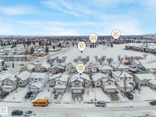 Snowy aerial view with a residential view - 2919 151A Avenue, Edmonton, AB - Outdoor With View