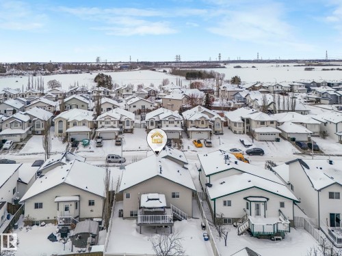 Snowy aerial view with a residential view - 2919 151A Avenue, Edmonton, AB - Outdoor With View