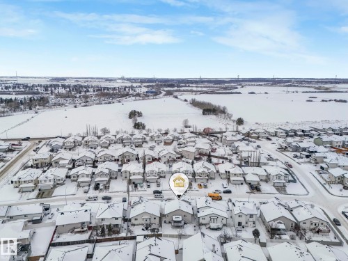 Snowy aerial view with a residential view - 2919 151A Avenue, Edmonton, AB - Outdoor With View