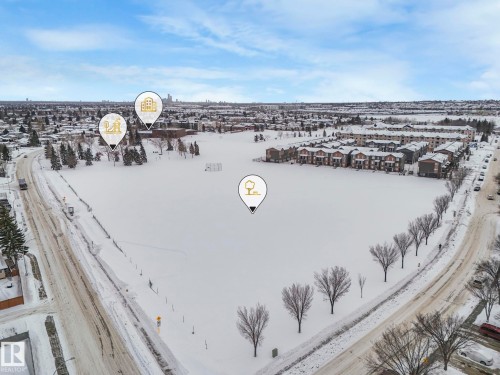 Snowy aerial view featuring a residential view - 2919 151A Avenue, Edmonton, AB - Outdoor With View
