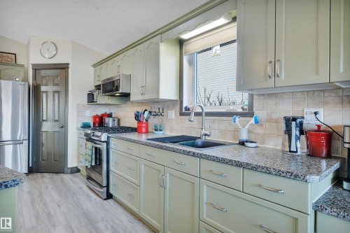 115 Parkside Drive, Wetaskiwin, AB - Indoor Photo Showing Kitchen With Stainless Steel Kitchen With Double Sink With Upgraded Kitchen