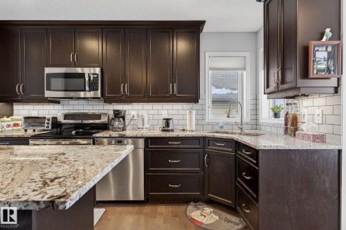 91 Westmews, Fort Saskatchewan, AB - Indoor Photo Showing Kitchen With Upgraded Kitchen