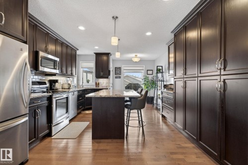91 Westmews, Fort Saskatchewan, AB - Indoor Photo Showing Kitchen With Stainless Steel Kitchen With Upgraded Kitchen
