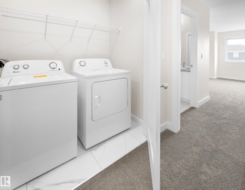 752 Berg Loop, Leduc, AB - Indoor Photo Showing Laundry Room