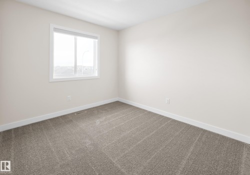 752 Berg Loop, Leduc, AB - Indoor Photo Showing Other Room