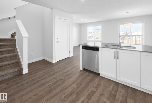 760 Berg Loop, Leduc, AB - Indoor Photo Showing Kitchen With Double Sink