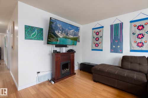 6103 53 Avenue, Cold Lake, AB - Indoor Photo Showing Living Room With Fireplace