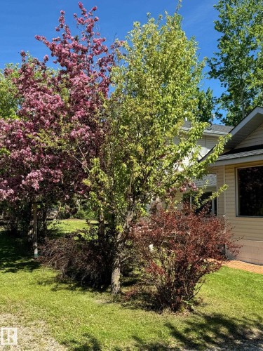 Exterior view of a fireplace - 516 5 Street, Rural Lac Ste. Anne County, AB - Outdoor