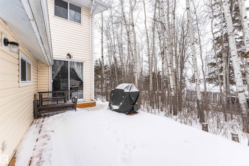 Snowy yard featuring a wooden deck - 516 5 Street, Rural Lac Ste. Anne County, AB - Outdoor