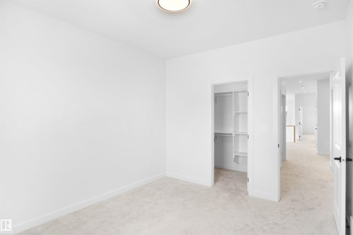 11 Trill Point(E), Spruce Grove, AB - Indoor Photo Showing Other Room
