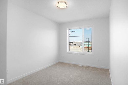 11 Trill Point(E), Spruce Grove, AB - Indoor Photo Showing Other Room