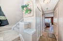 Staircase with baseboards and a textured ceiling - 2927 30 Street, Edmonton, AB  - Indoor Photo Showing Other Room 