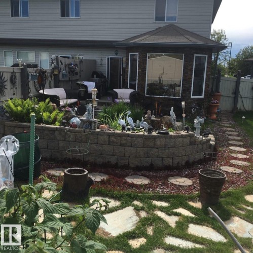 Back of house with brick siding and a patio - 2927 30 Street, Edmonton, AB - Outdoor