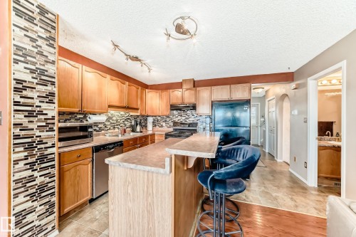 2927 30 Street, Edmonton, AB - Indoor Photo Showing Kitchen With Double Sink