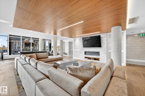 504 14105 West Block Drive, Edmonton, AB - Indoor Photo Showing Living Room With Fireplace