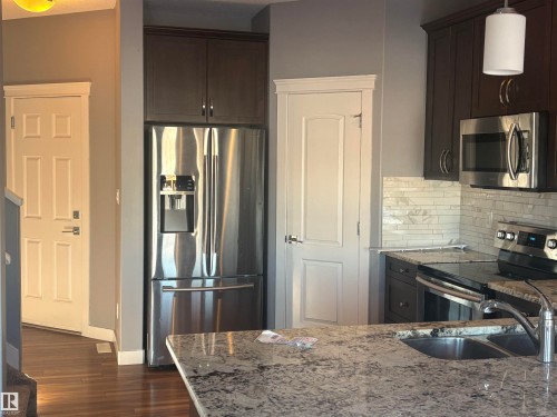 6694 Cardinal Road, Edmonton, AB - Indoor Photo Showing Kitchen With Stainless Steel Kitchen With Double Sink With Upgraded Kitchen