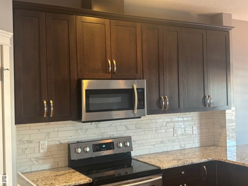 6694 Cardinal Road, Edmonton, AB - Indoor Photo Showing Kitchen With Upgraded Kitchen