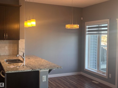6694 Cardinal Road, Edmonton, AB - Indoor Photo Showing Kitchen With Double Sink