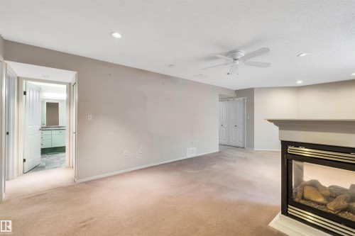 91 Hamilton Crescent, St. Albert, AB - Indoor Photo Showing Other Room With Fireplace