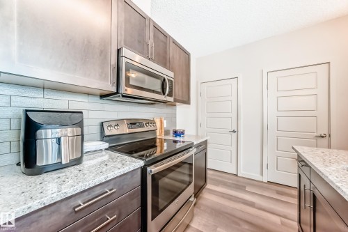 108 1144 Adamson Drive, Edmonton, AB - Indoor Photo Showing Kitchen With Upgraded Kitchen