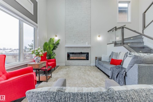 9007 181 Avenue, Edmonton, AB - Indoor Photo Showing Living Room With Fireplace