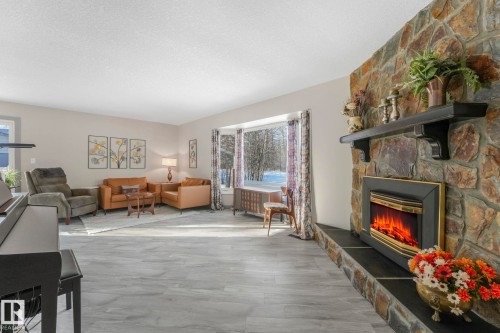 4835 60 Street, Rural Lac Ste. Anne County, AB - Indoor Photo Showing Living Room With Fireplace
