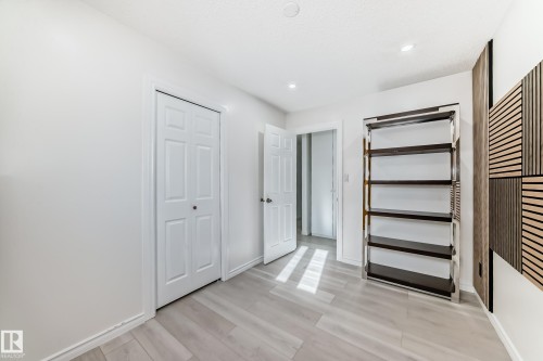 Unfurnished bedroom featuring light wood-type flooring and a closet - 10519 173 Avenue, Edmonton, AB - Indoor Photo Showing Other Room