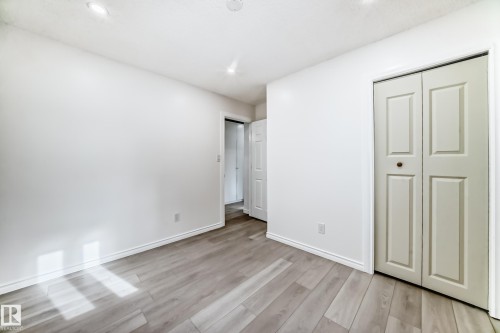 Unfurnished bedroom with light wood-style flooring, a closet, and recessed lighting - 10519 173 Avenue, Edmonton, AB - Indoor Photo Showing Other Room