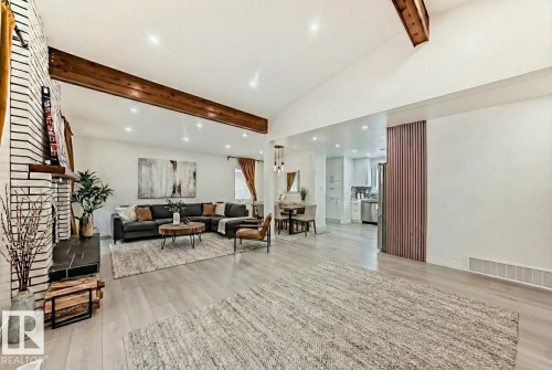 Community lobby with recessed lighting and vaulted ceiling with beams - 10519 173 Avenue, Edmonton, AB - Indoor Photo Showing Other Room