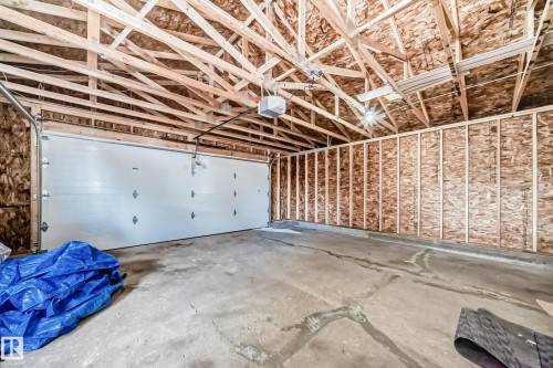 Garage with a garage door opener - 10519 173 Avenue, Edmonton, AB - Indoor Photo Showing Garage