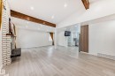 Unfurnished living room with recessed lighting, vaulted ceiling, and light wood-style flooring - 10519 173 Avenue, Edmonton, AB  - Indoor Photo Showing Other Room 
