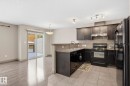 21 5120 164 Avenue, Edmonton, AB  - Indoor Photo Showing Kitchen With Double Sink 