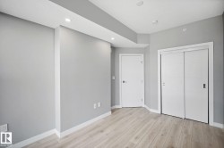 Unfurnished bedroom featuring light wood-type flooring, recessed lighting, and a closet - 